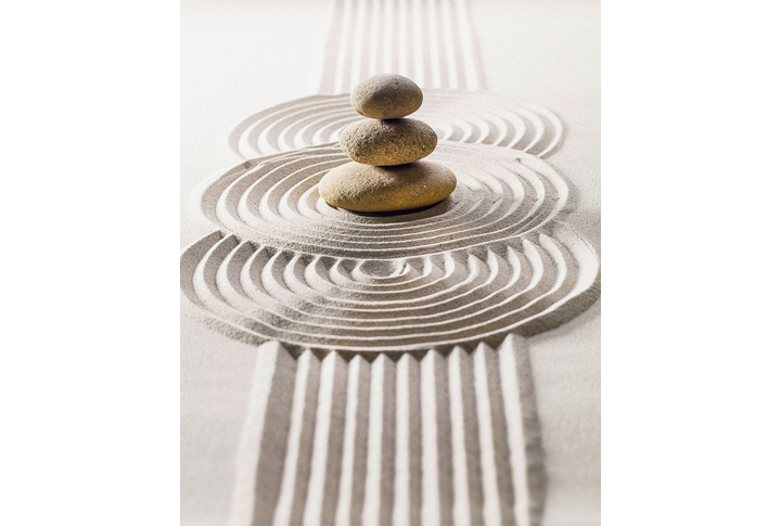 Фотообои «Узоры на песке и гладкие камни»