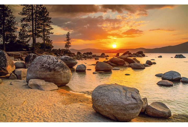 Фотообои «Закат над озером с камнями»