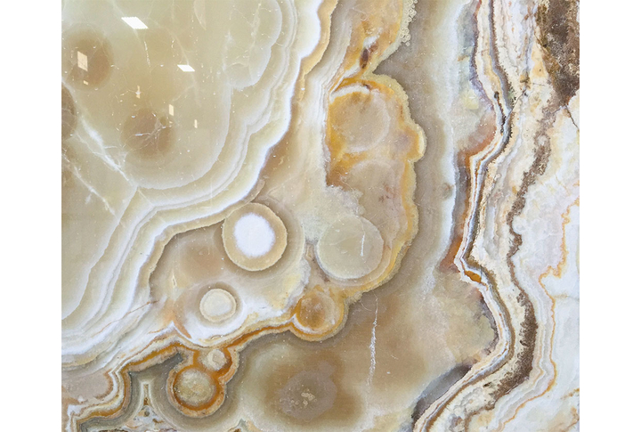 Фотообои «Срез камня оникса в бежевых тонах»